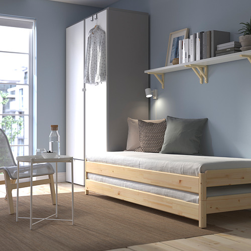 UTÅKER stackable bed with 2 mattresses