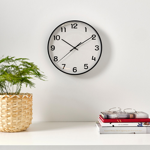 PLUTTIS wall clock