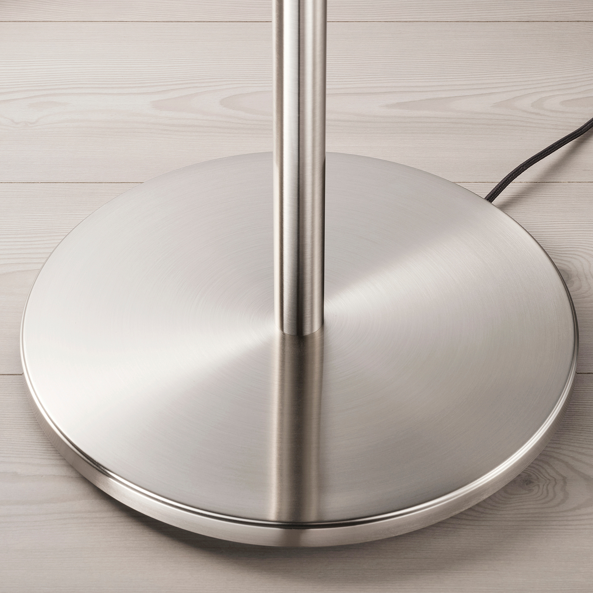silver floor lamp with shelves