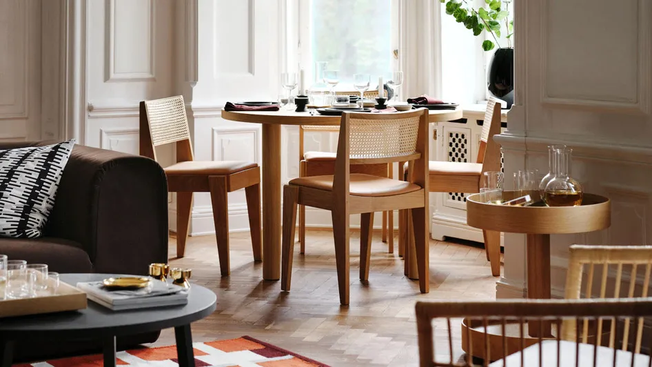 A modern Scandinavian dining room that blends with the living area